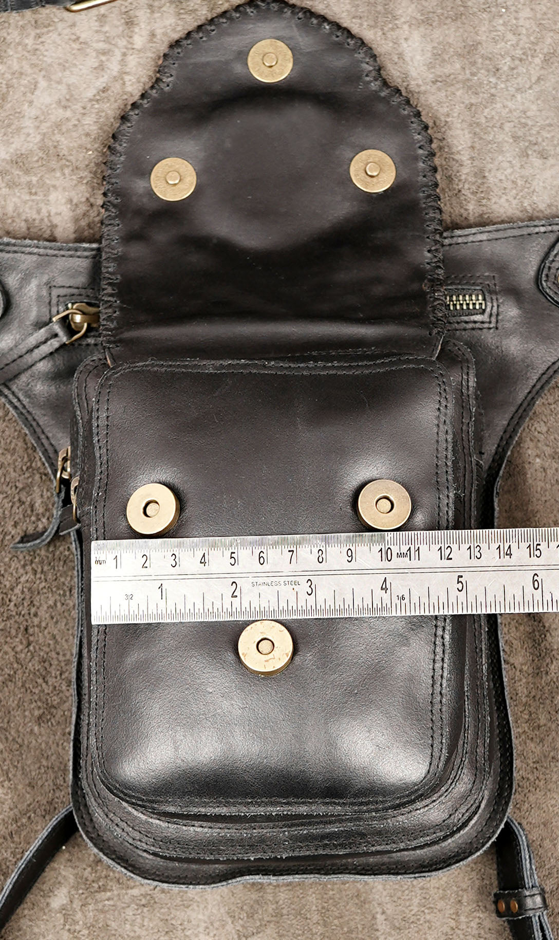 Handmade leather festival bag with tan leather medallion trim