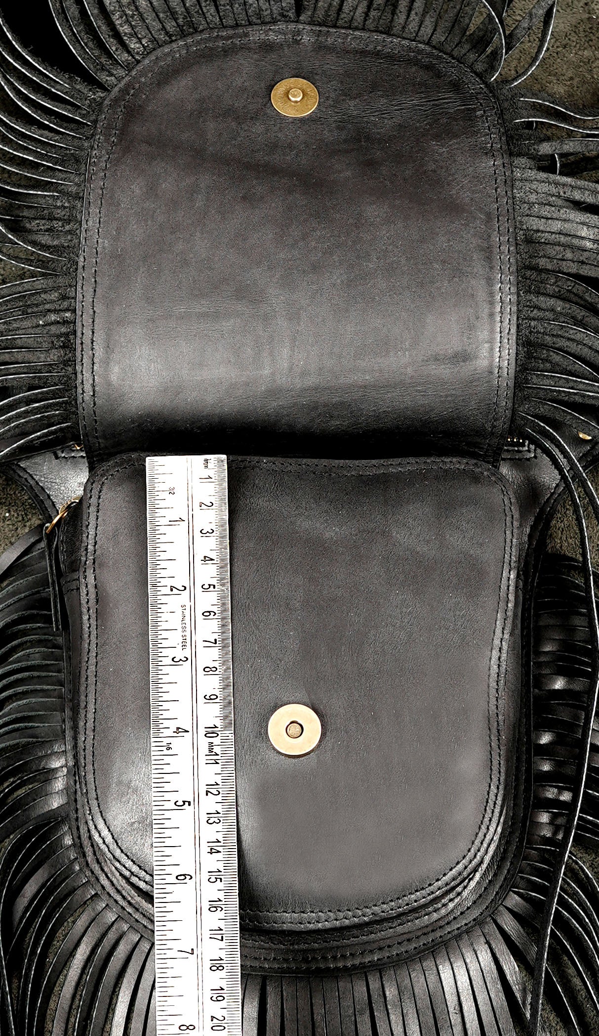 Handmade leather medicine bag with fringe and natural stone