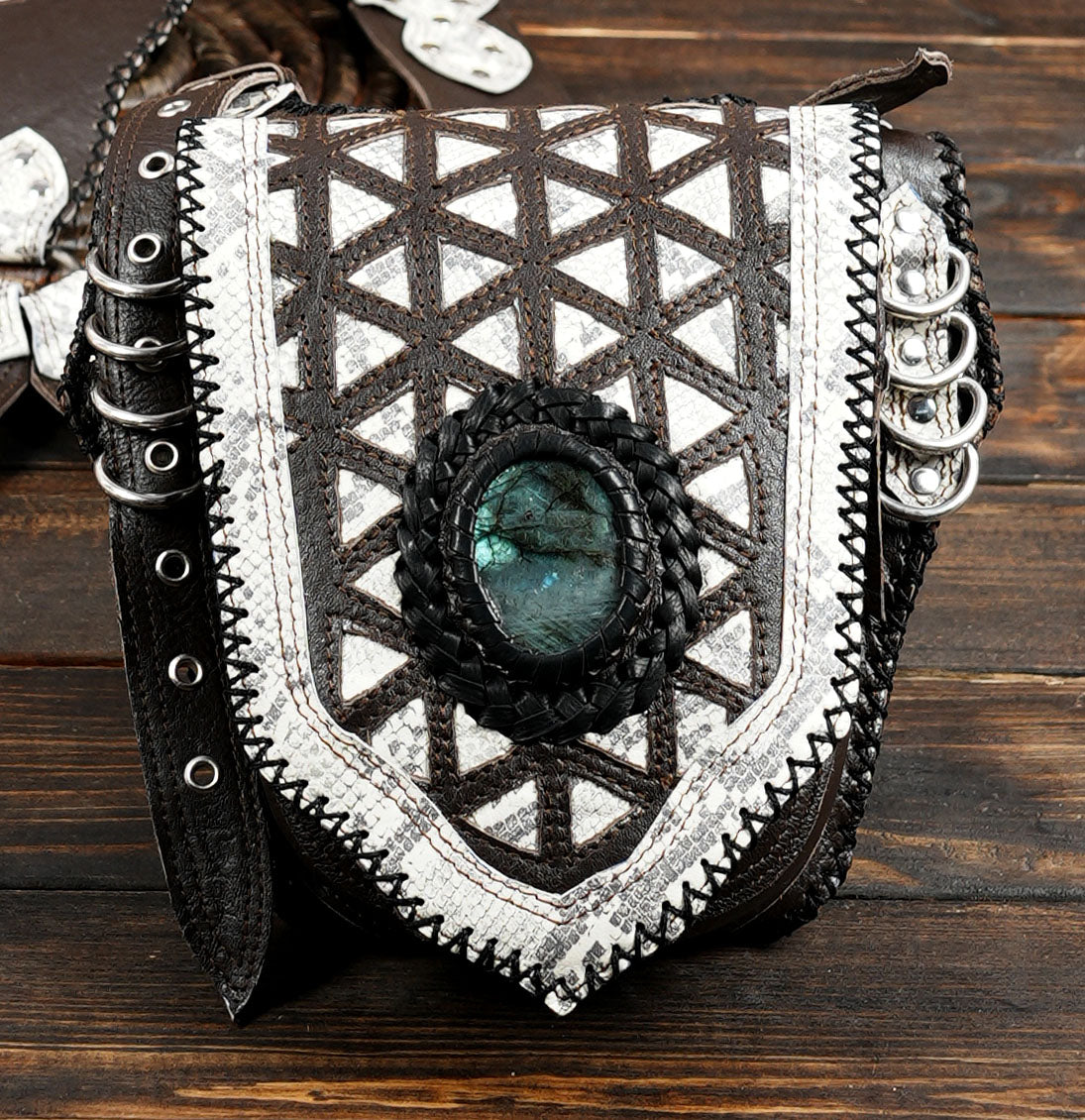 Handmade unisex leather harness featuring natural labradorite stones