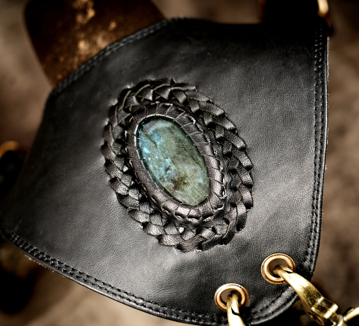 Black leather steampunk shoulder harness with utility storage pouches