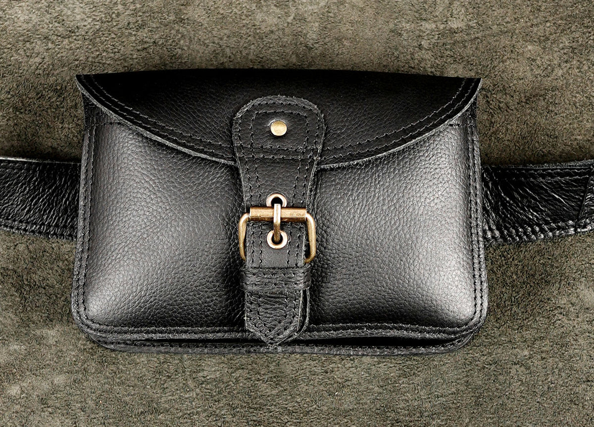 Black pebble grain leather fanny pack with adjustable brass buckle belt