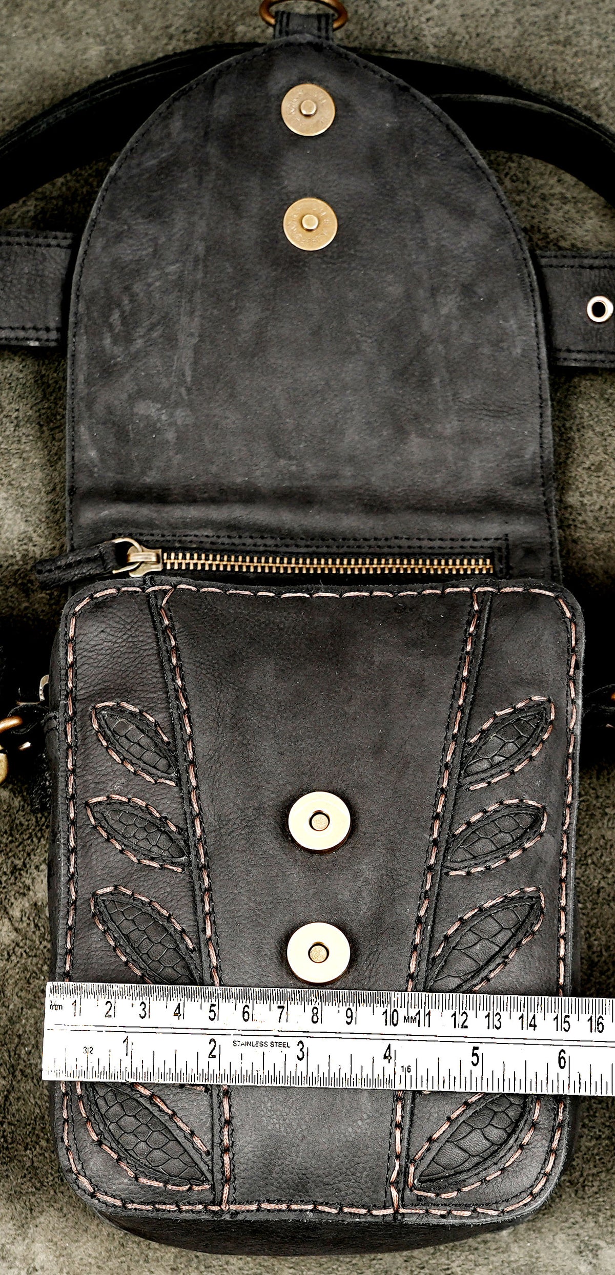 Handcrafted studded leather fanny pack for festivals and travelHandcrafted studded leather fanny pack for festivals and travel