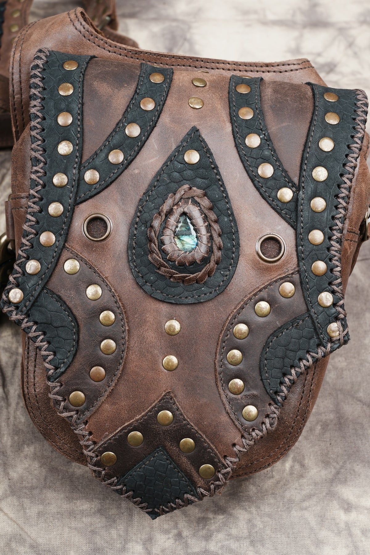 Brown leather utility pouch set for Burning Man festivals and alternative fashion