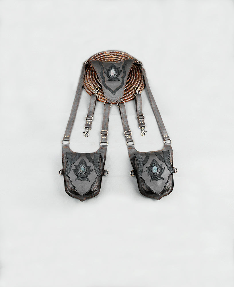 Unisex leather double pocket harness bag with grey leather pouches and decorative stone accents.