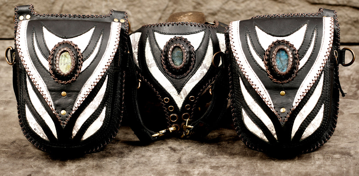 Black and white patterned utility holster with adjustable shoulder straps