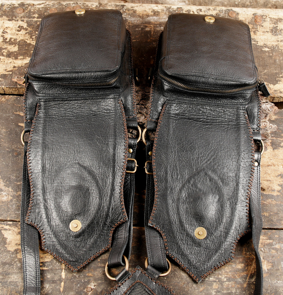 Steampunk leather shoulder rig with adjustable straps and twin bags   