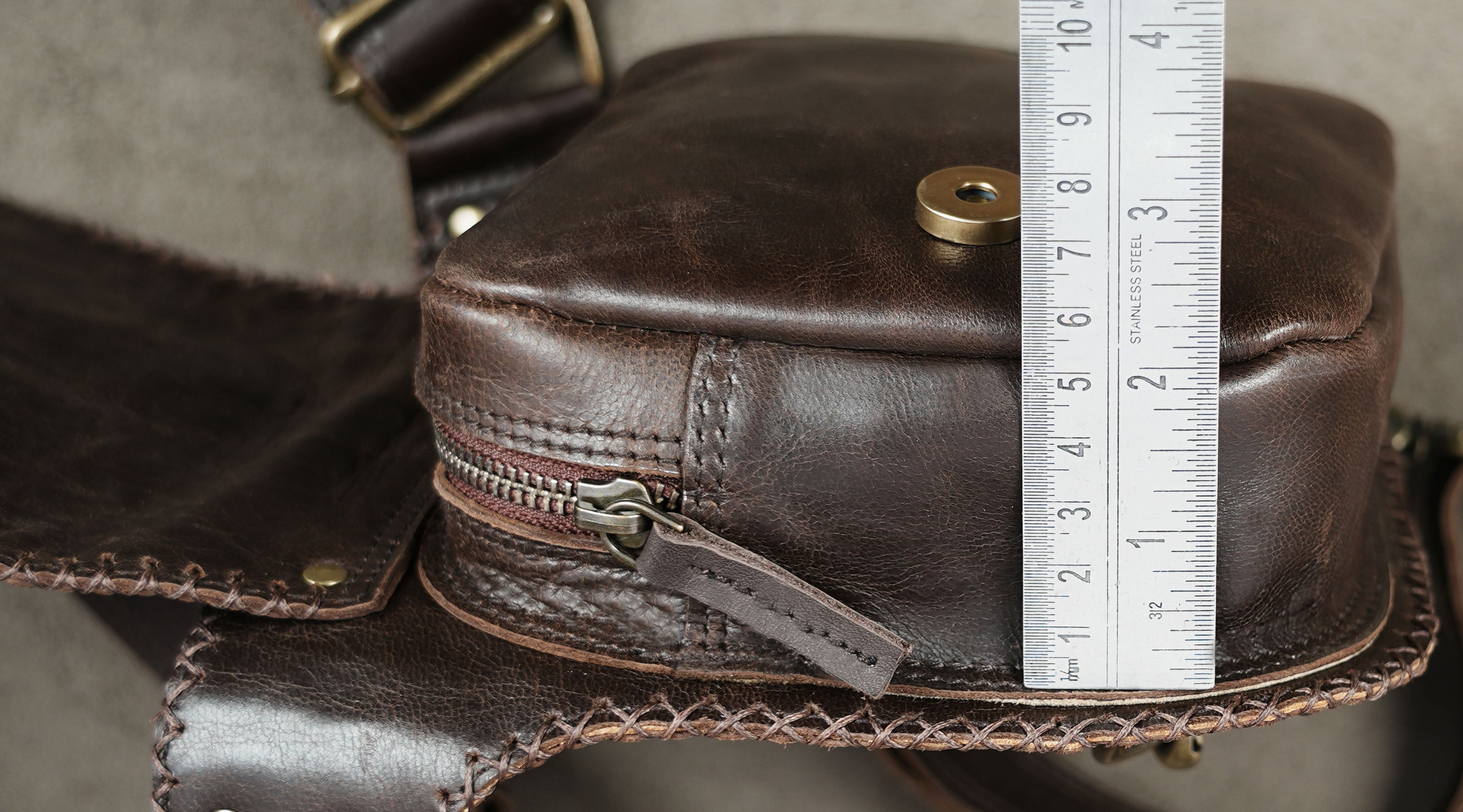 Hands-free brown leather utility pouch for travel and festivals