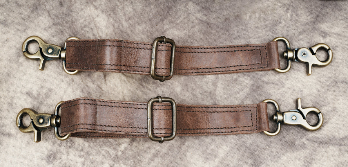 Handcrafted leather double pouch harness for rave outfits and festival clothing