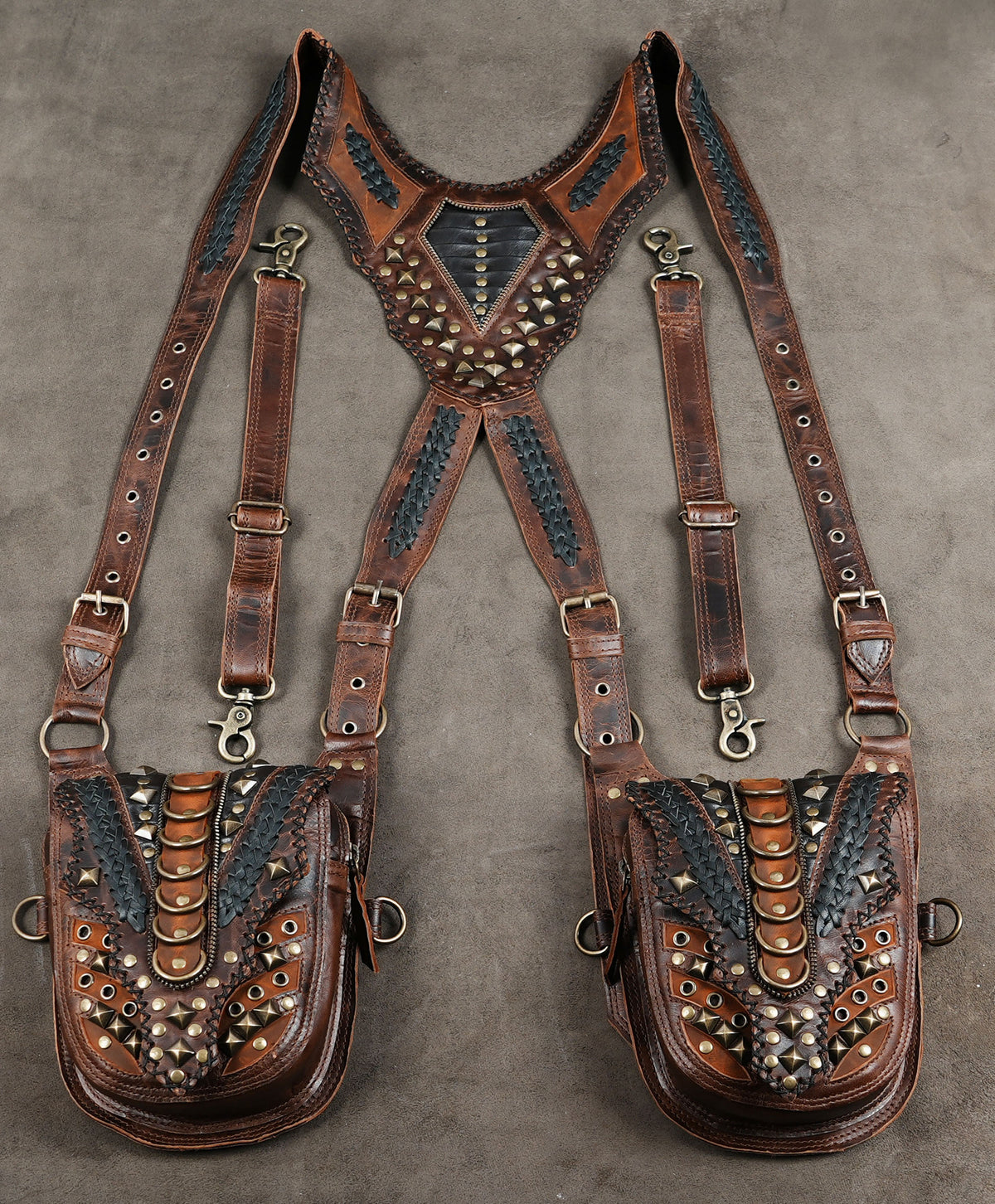 Brown leather costume harness with gothic detailing and antique brass-tone rings