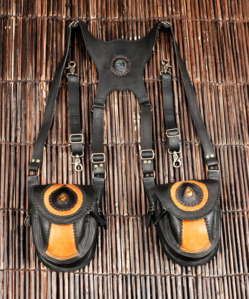 Black and tan leather shoulder holster with dual zip pockets