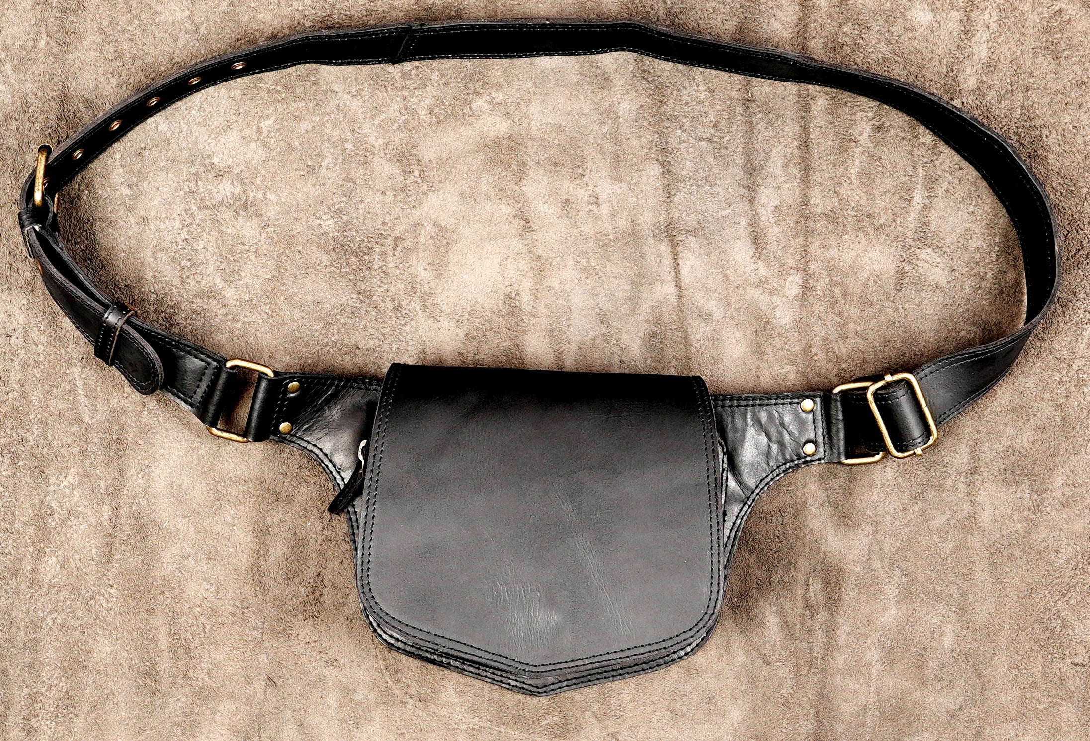 Black leather belt with storage pocket