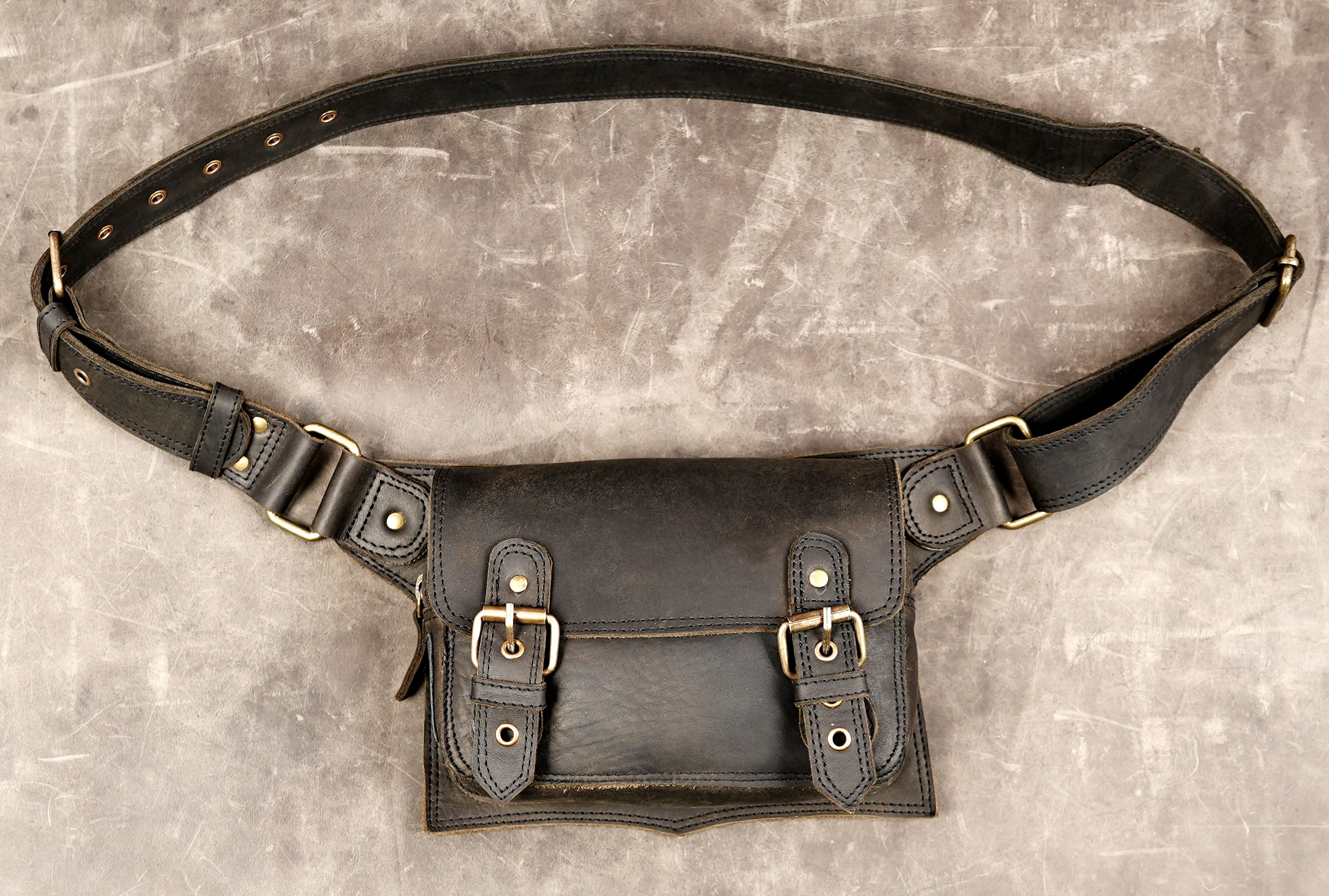 Rustic leather hip belt with antique brass hardware