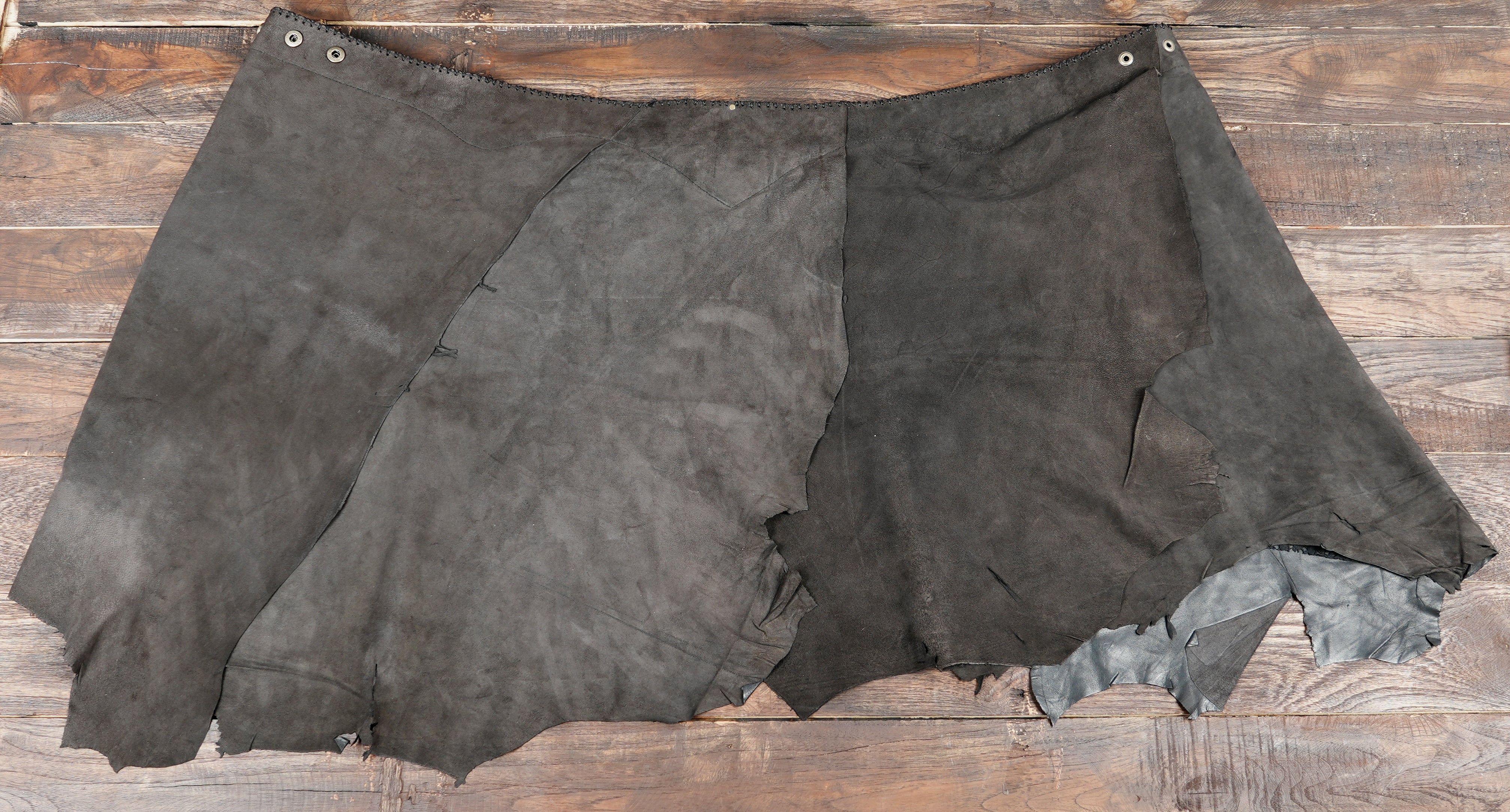 Layered leather skirt with tan trim and studded detail