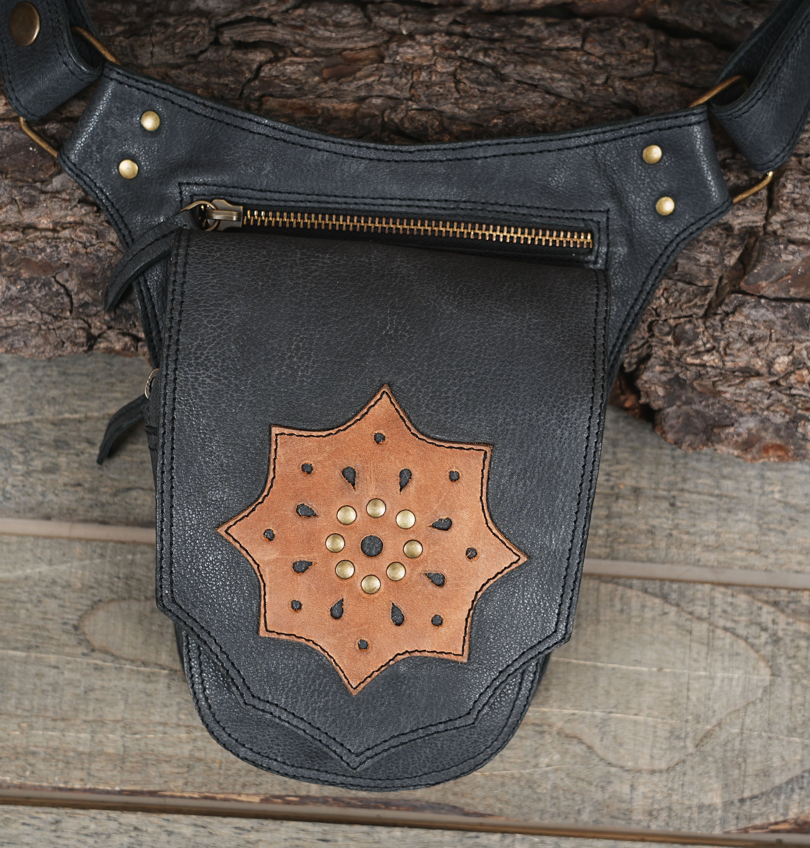 Leather belt bag with adjustable strap and front zip pocket