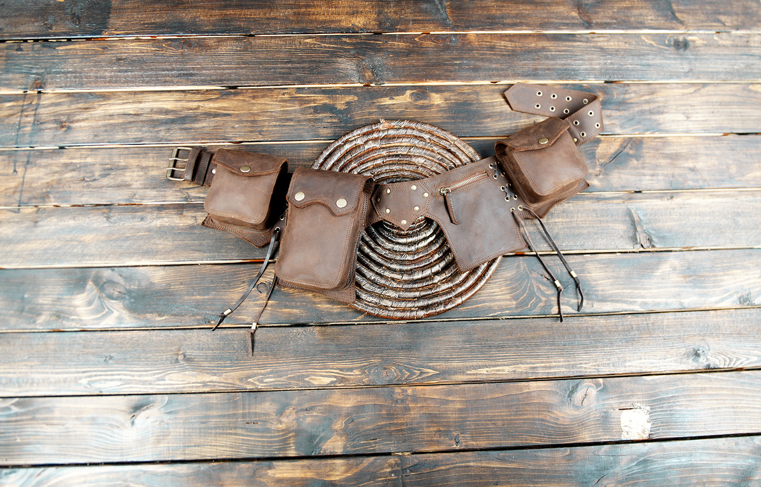 Leather biker belt with five pockets, close up view