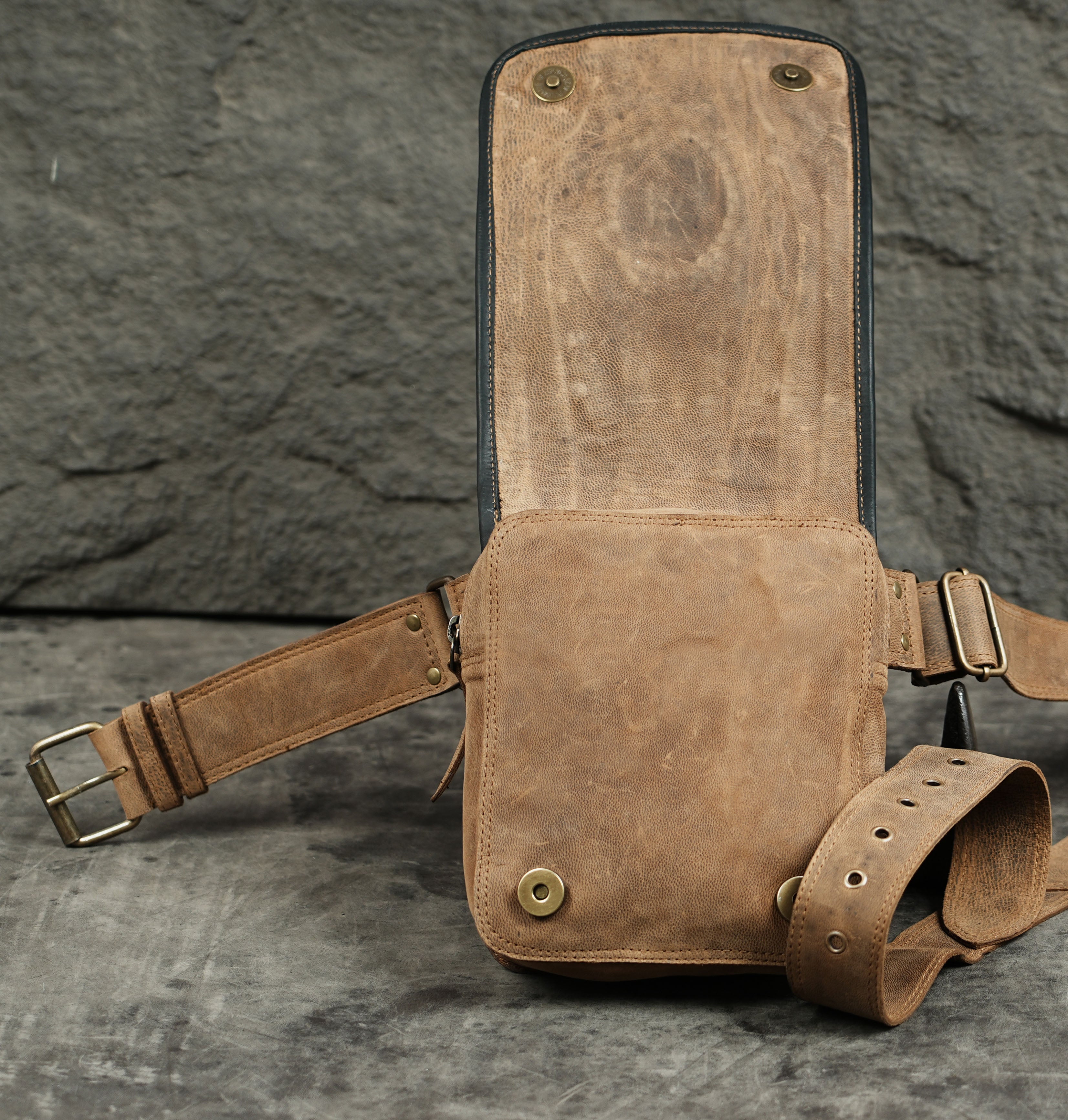 Leather crossbody bag with braided stone, full flap view