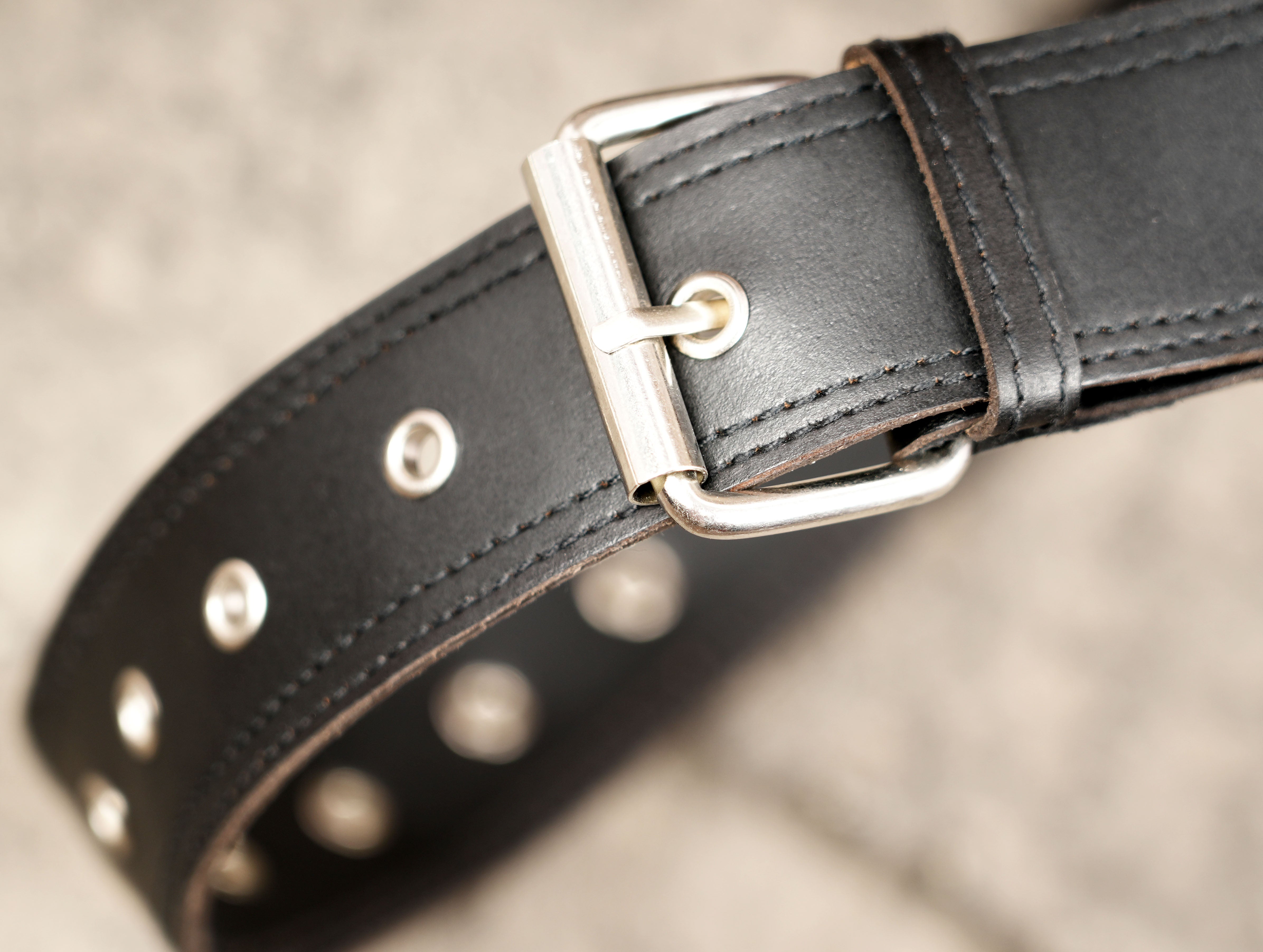 Leather crossbody bag with studded flap, full view