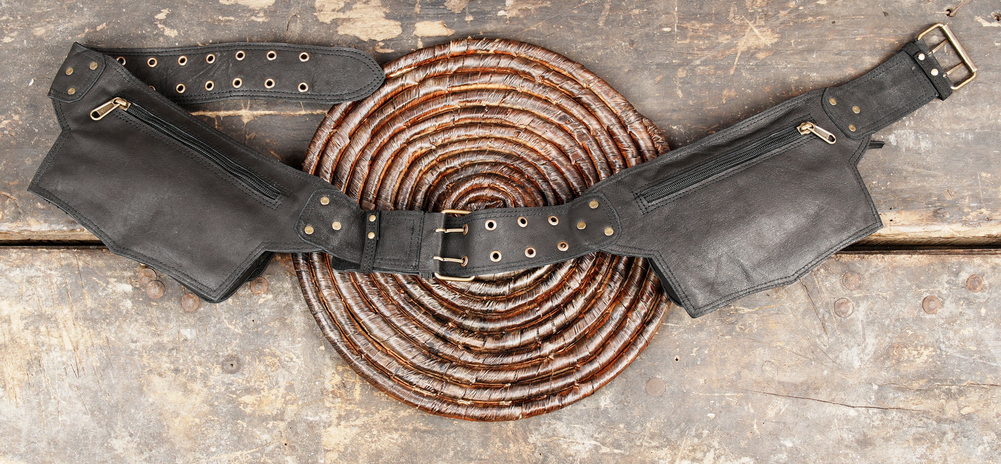 Leather festival hip belt with dual pockets and metal hardware