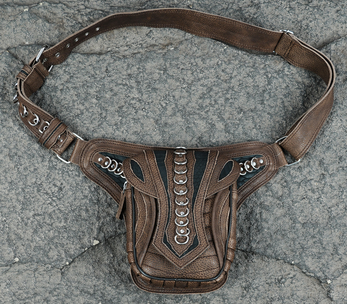 Leather festival pouch with metallic ring embellishment