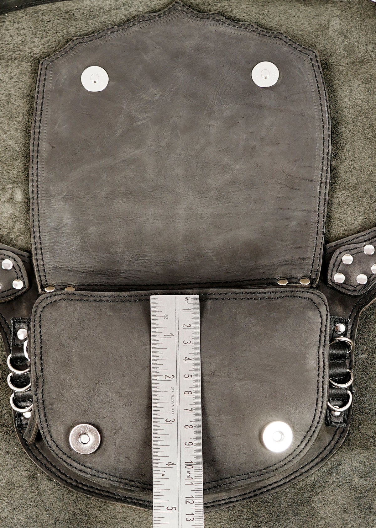 Leather pack with sacred geometry pattern, top view