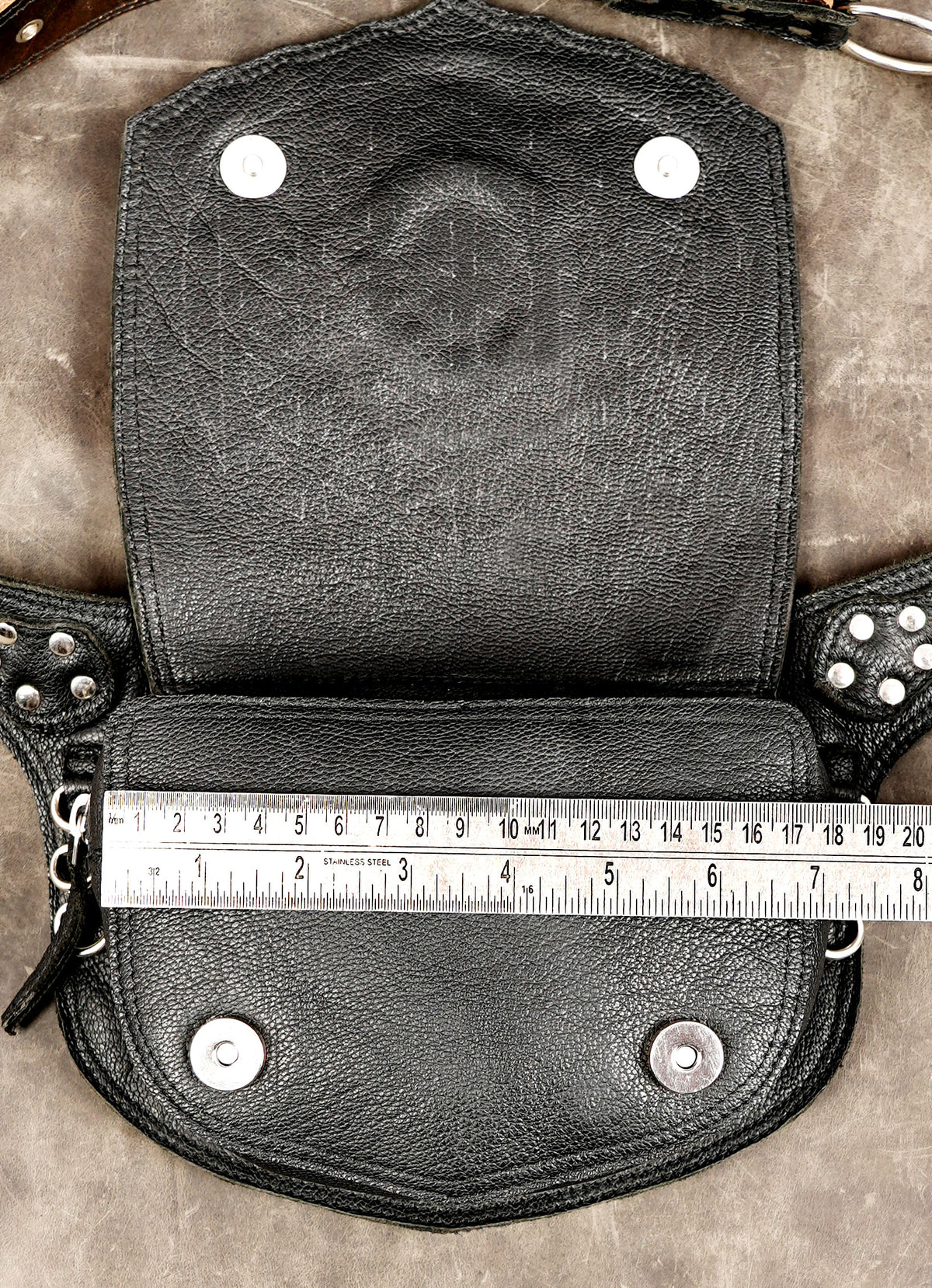 Leather pouch with laser cut lattice pattern, top view