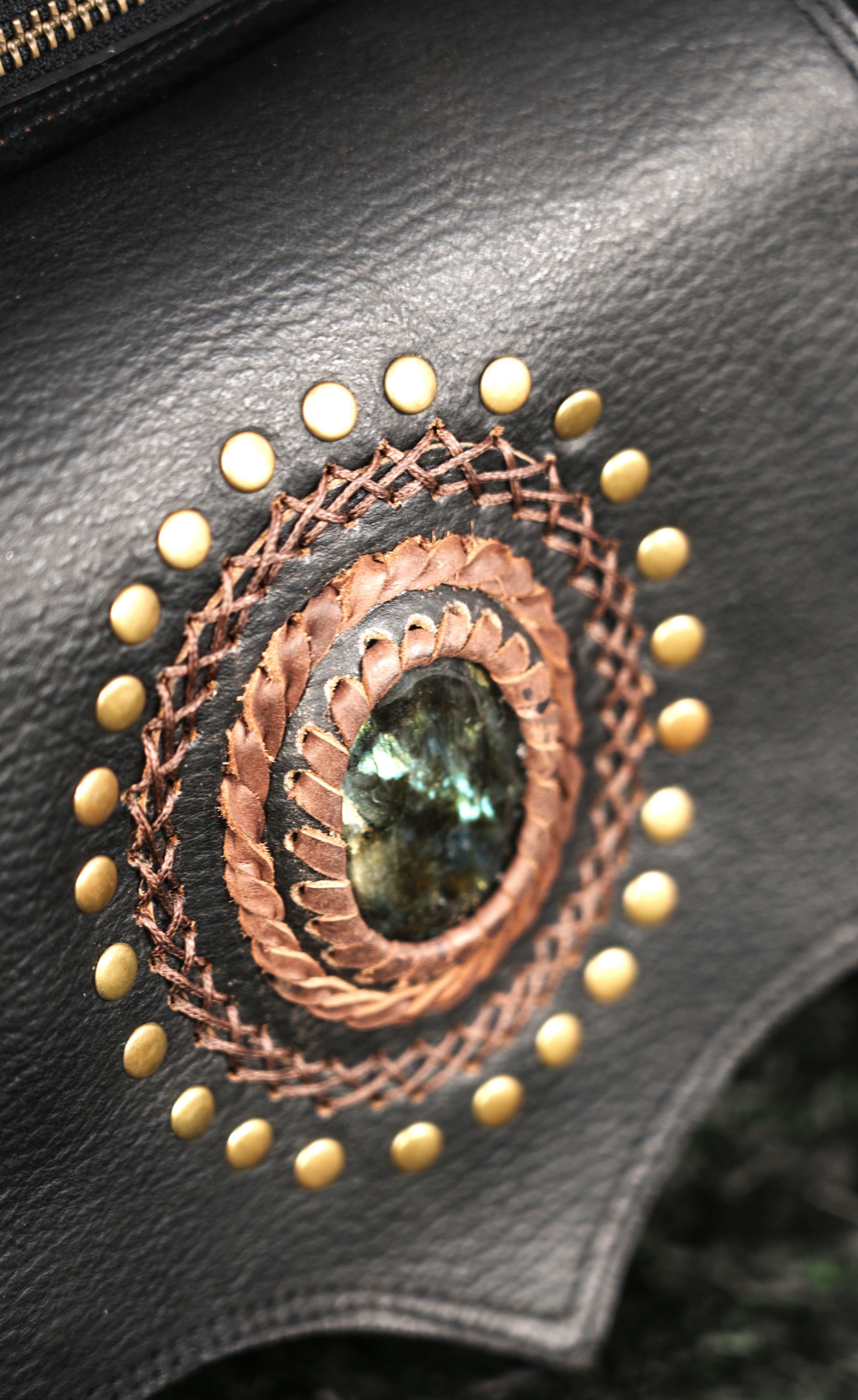 Leather waist bag with lace up sides and crystal centerpiece