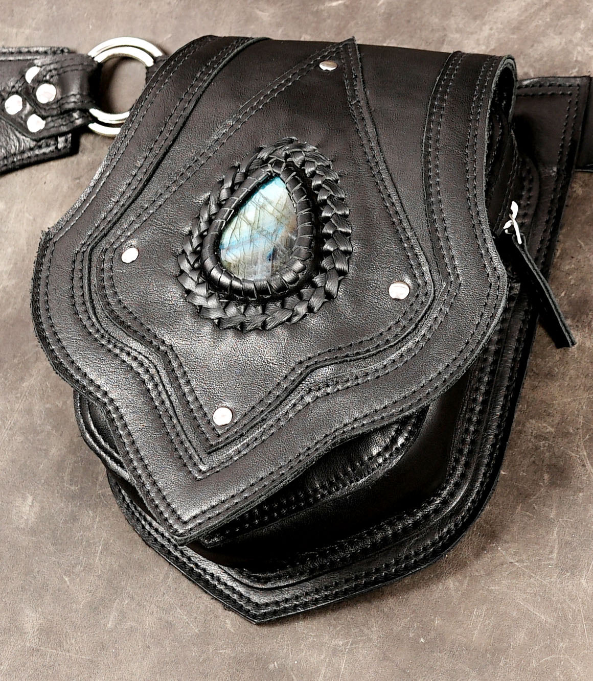 Leather warrior belt with scalloped tooling and crystal stones
