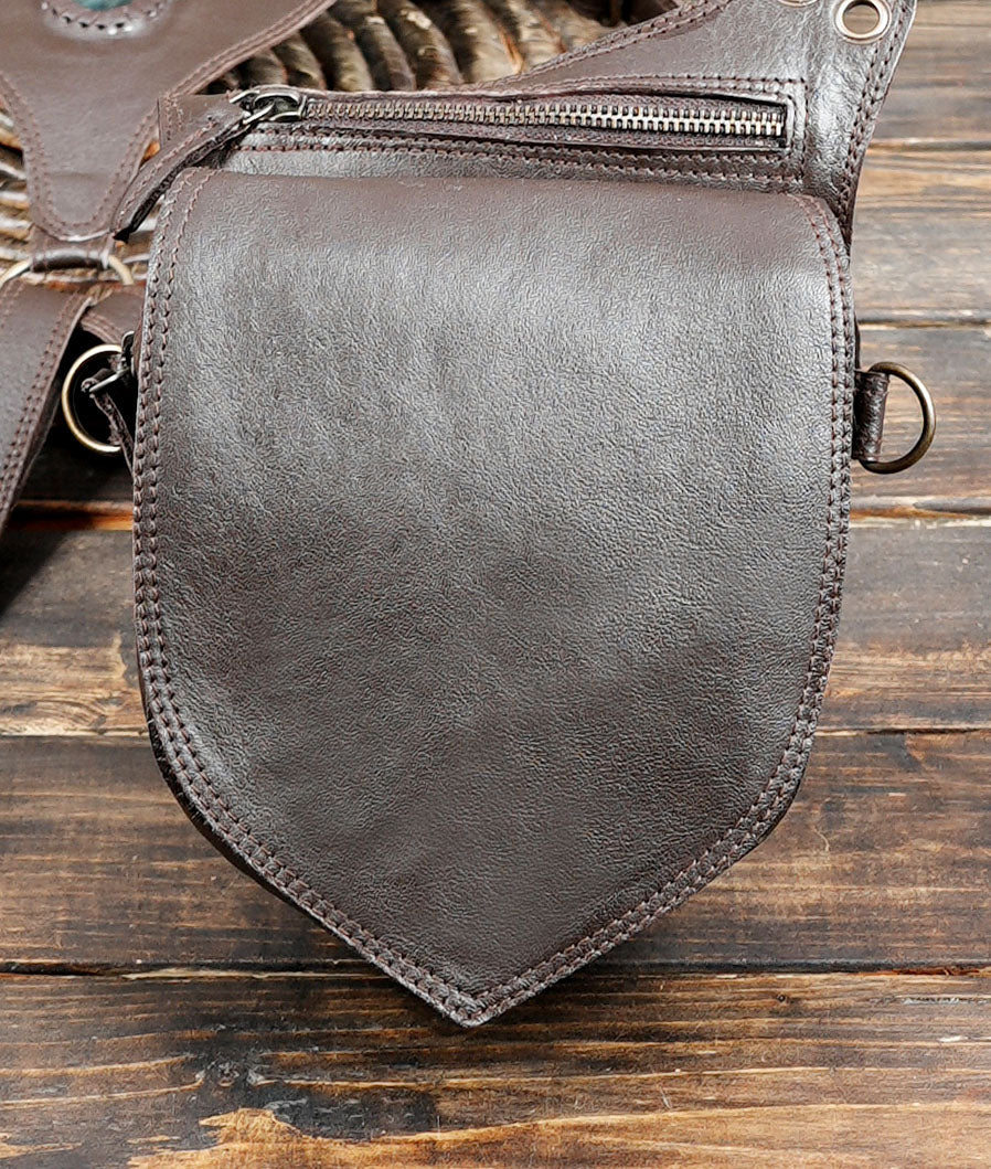Brown leather double holster bag for music festivals and alternative fashion