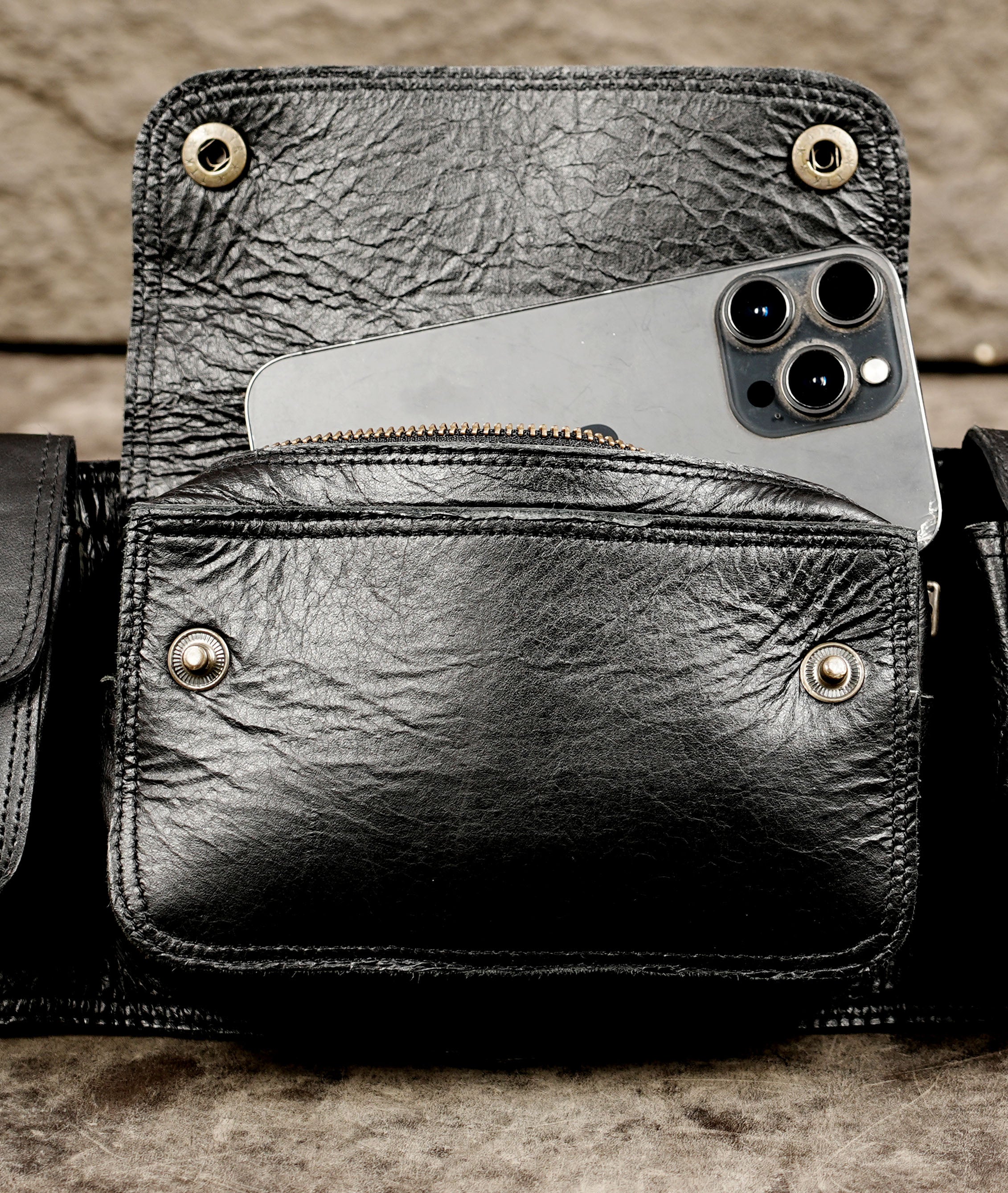 Multi-compartment leather waist bag with adjustable buckle