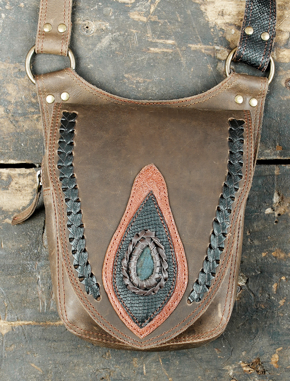 Handmade brown leather festival belt bag with two side pouches and decorative stones
 