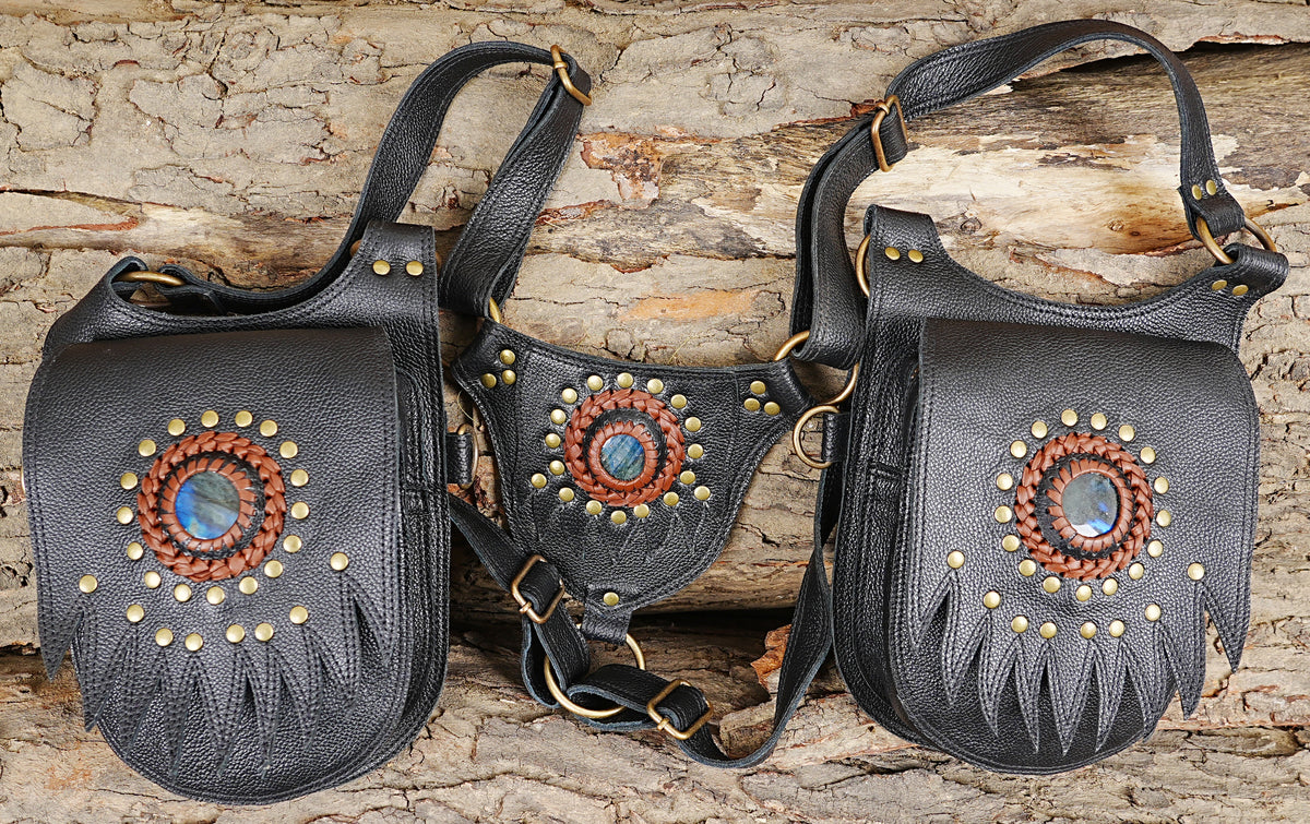 Leather steampunk chest harness bag with gemstone details brass studs and utility pockets