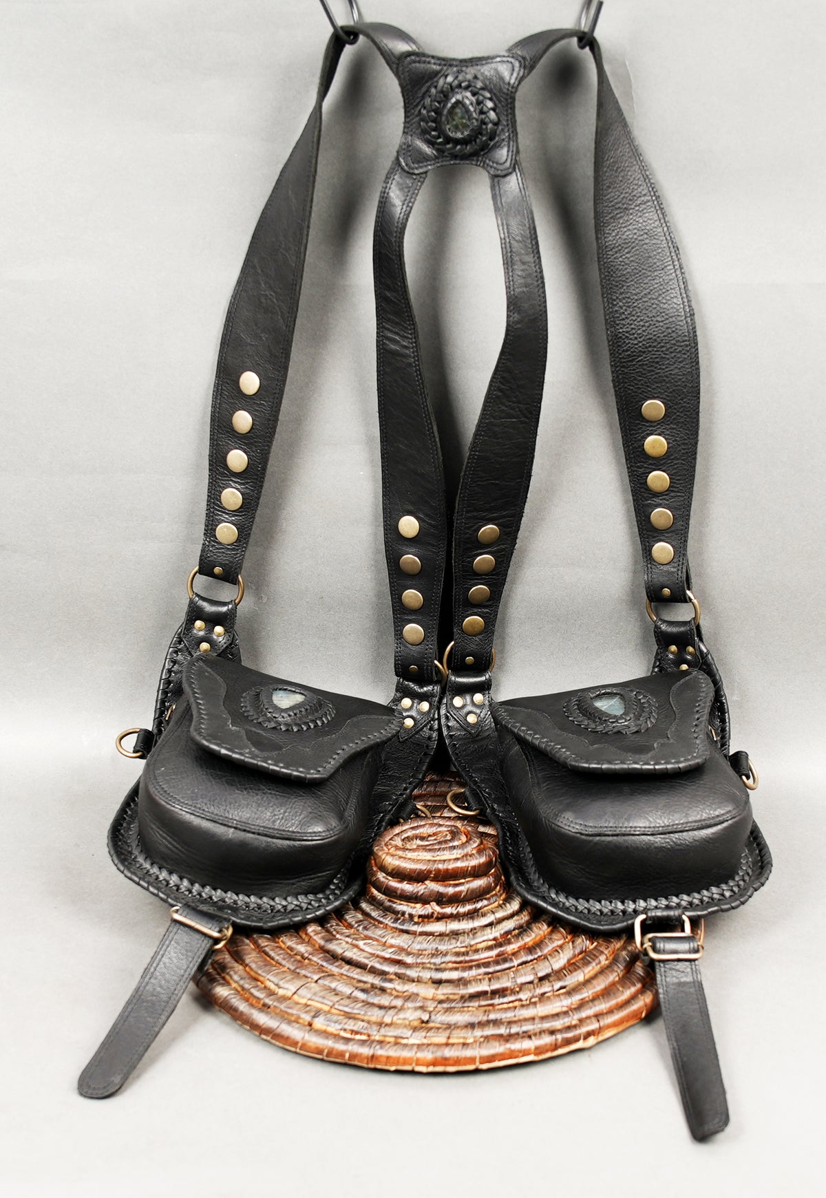 Black leather shoulder harness with matching double hip bags for men and women