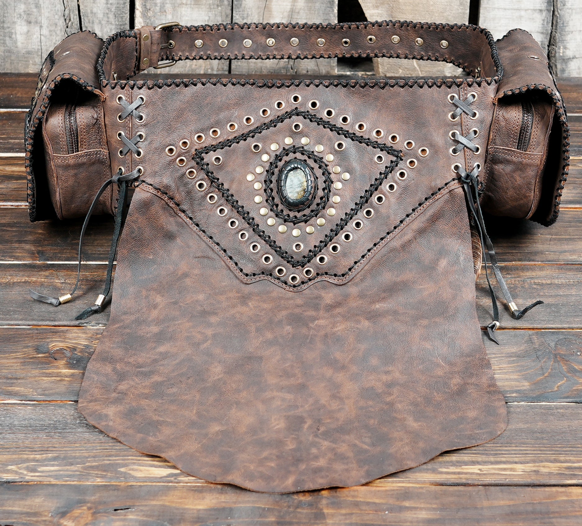 Native style leather skirt with labradorite stones, close up