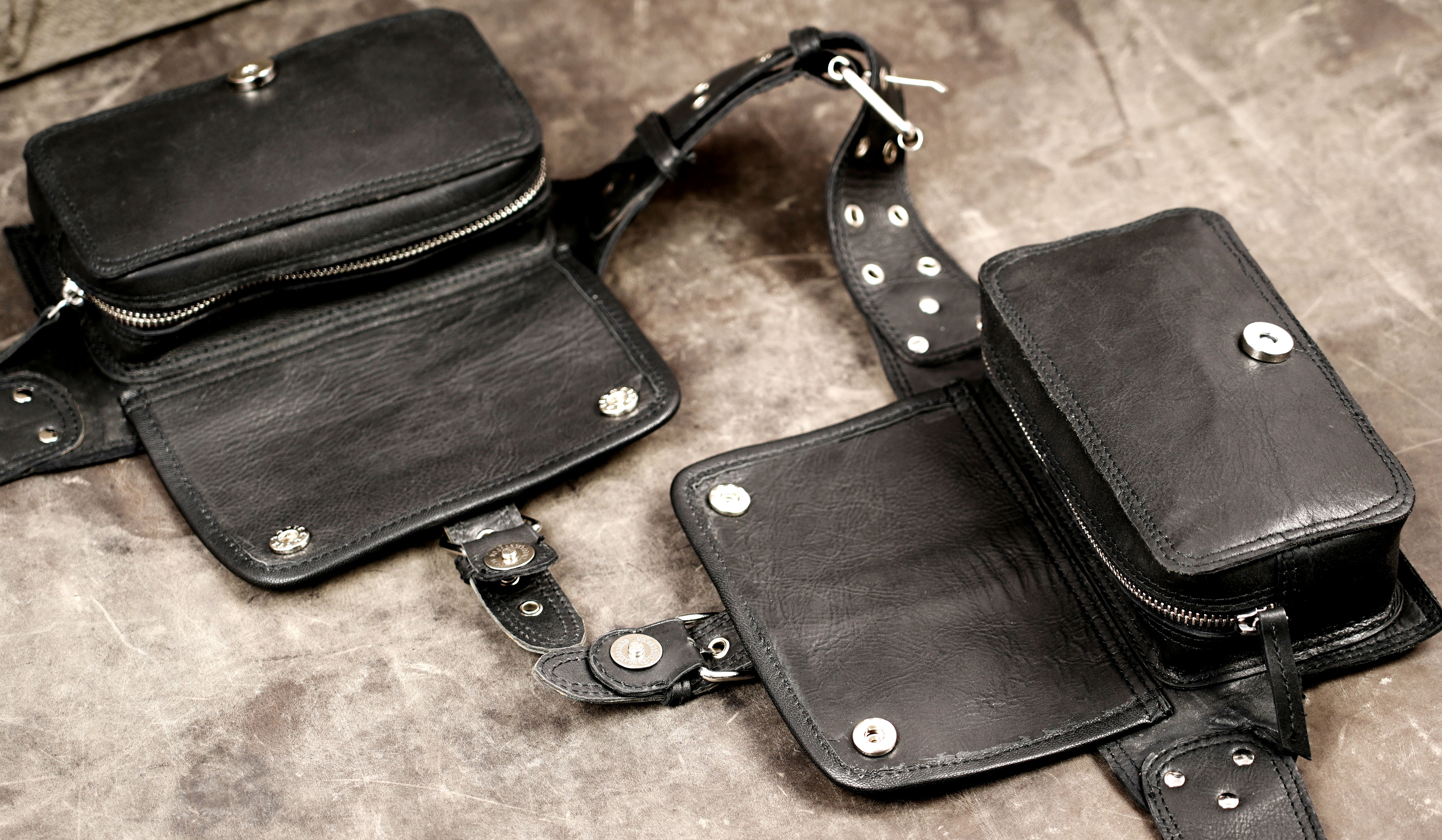 Old world leather belt, grommet and buckle detail
