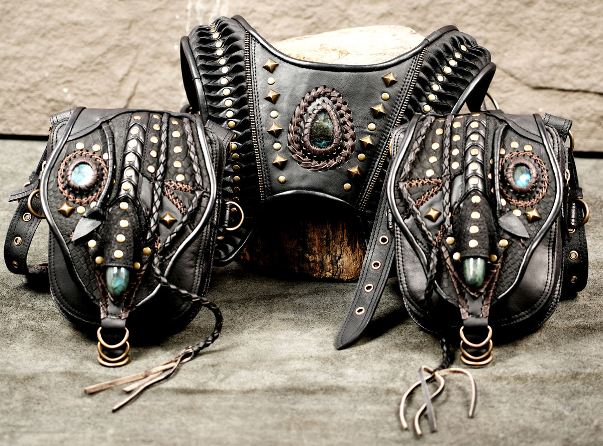 Gothic black leather hip pouch set with studded straps and decorative gemstone details
 