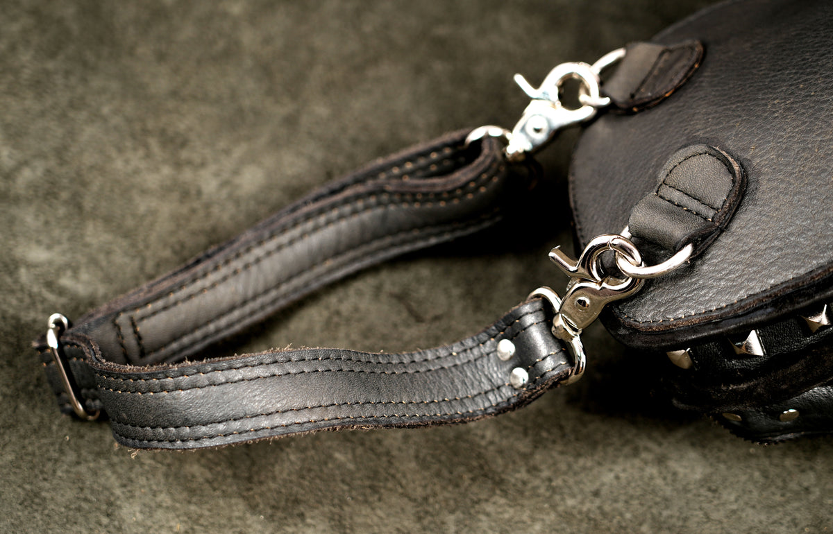Post-apocalyptic leather leg pouch with metal trim