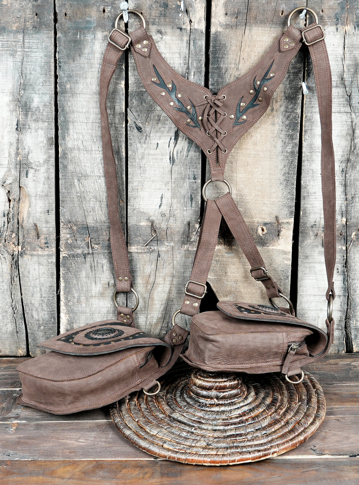 Adjustable leather shoulder holster bag with decorative hardware