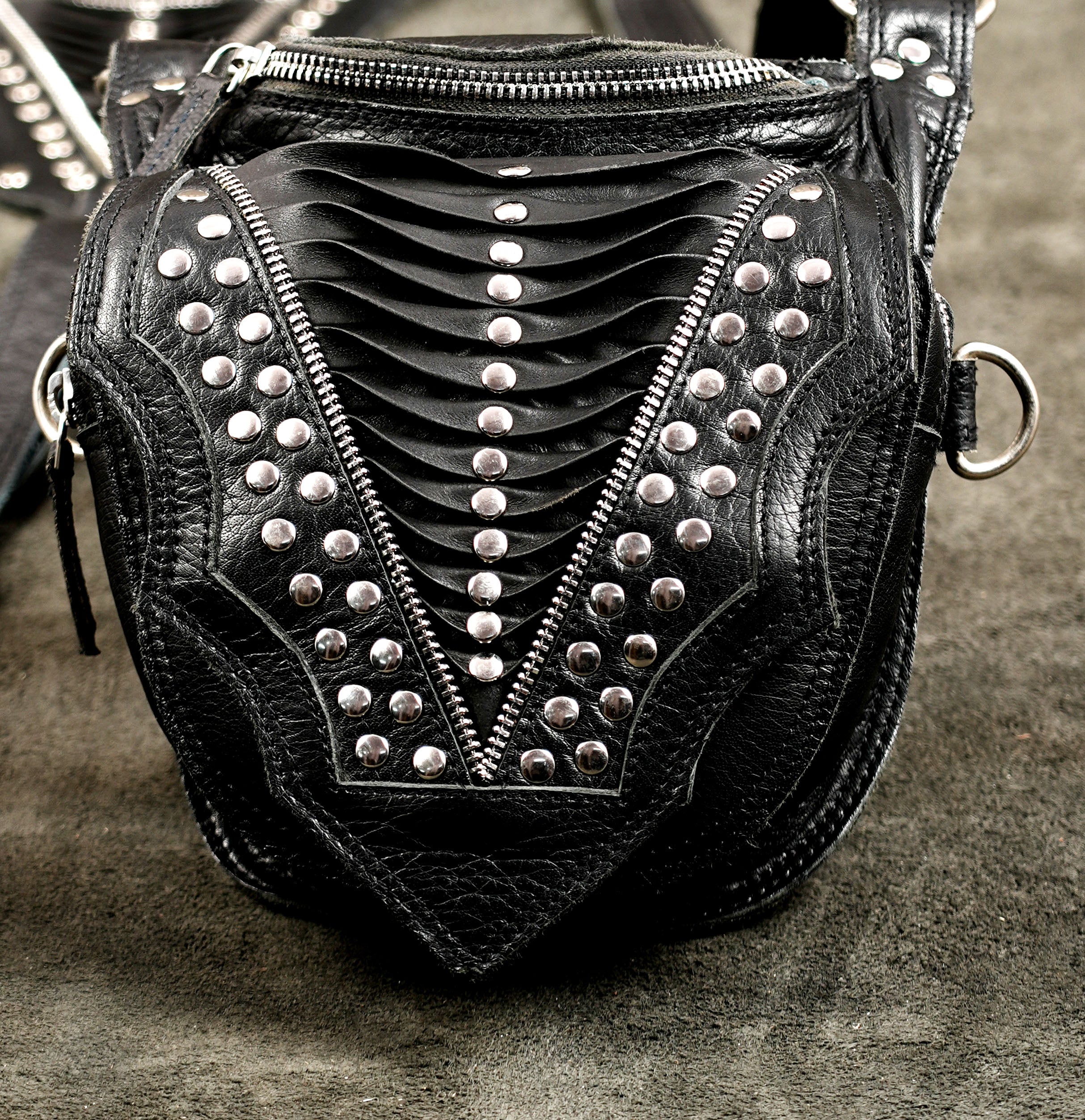Punk leather harness with zip pockets and adjustable straps