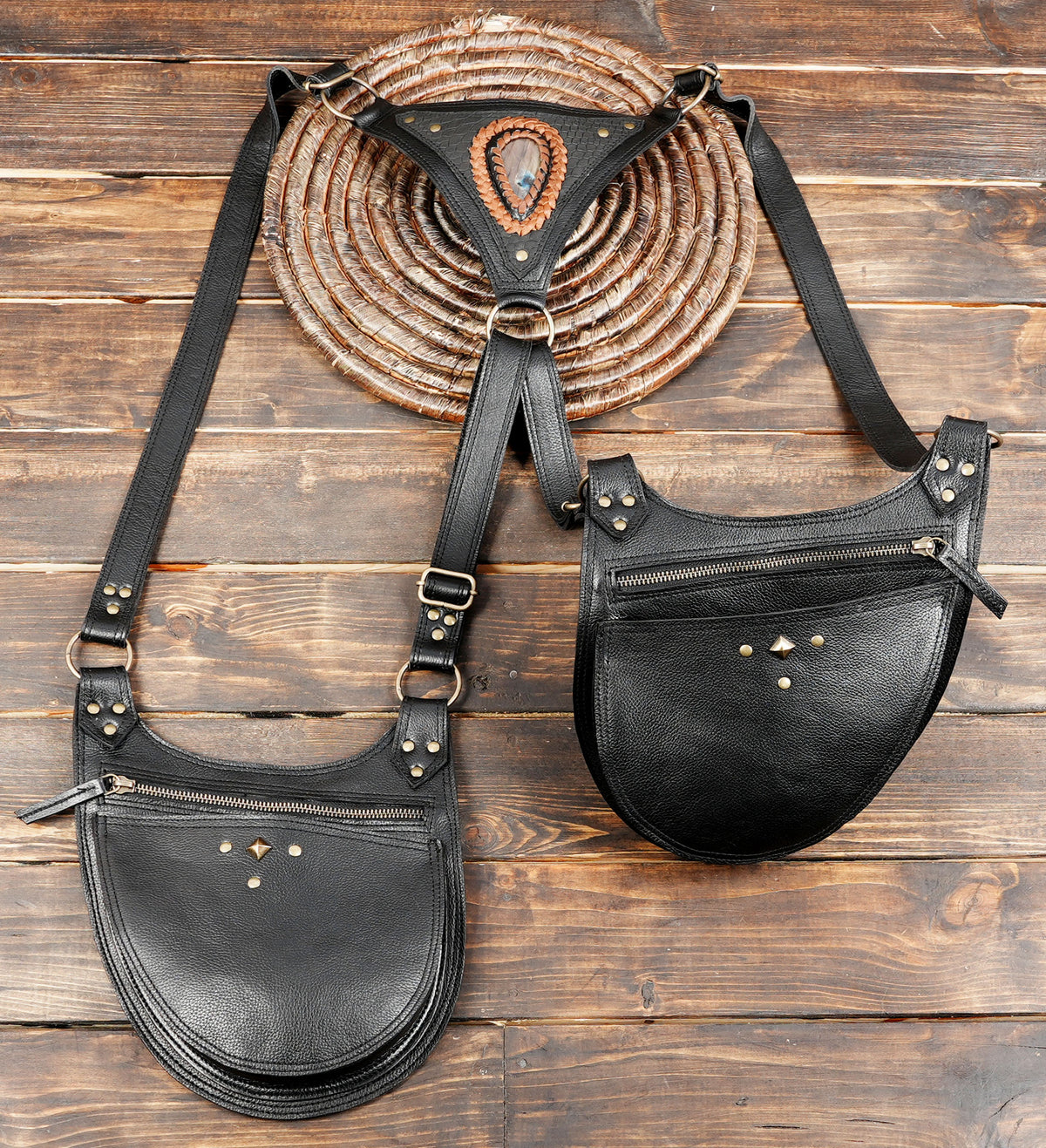 Black leather utility holster harness with adjustable shoulder straps for steampunk and alternative fashion.