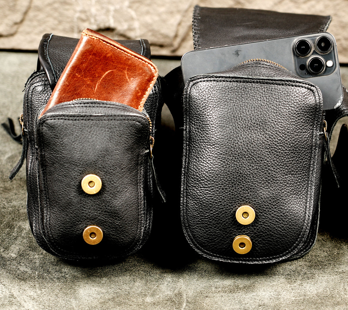 Western gothic black leather hip bag with carved pockets and buckle clasp