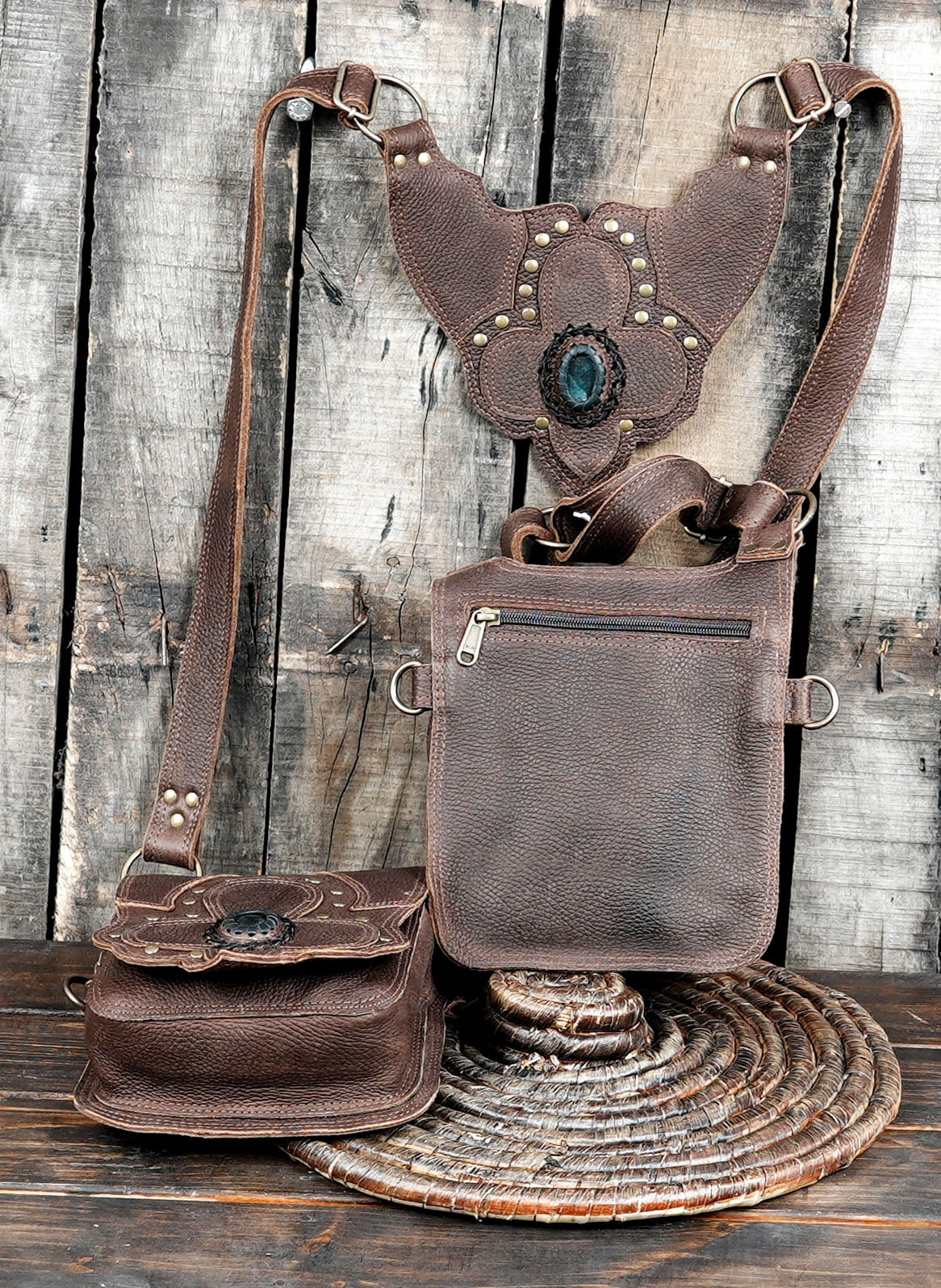Brown leather double pouch bag with decorative stud detailing