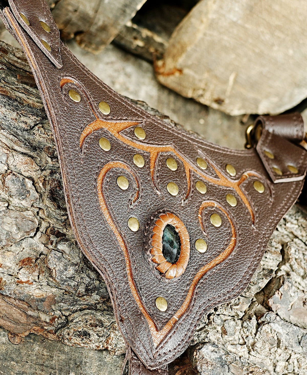 Unisex leather utility harness with decorative gemstone pockets and brass buckles