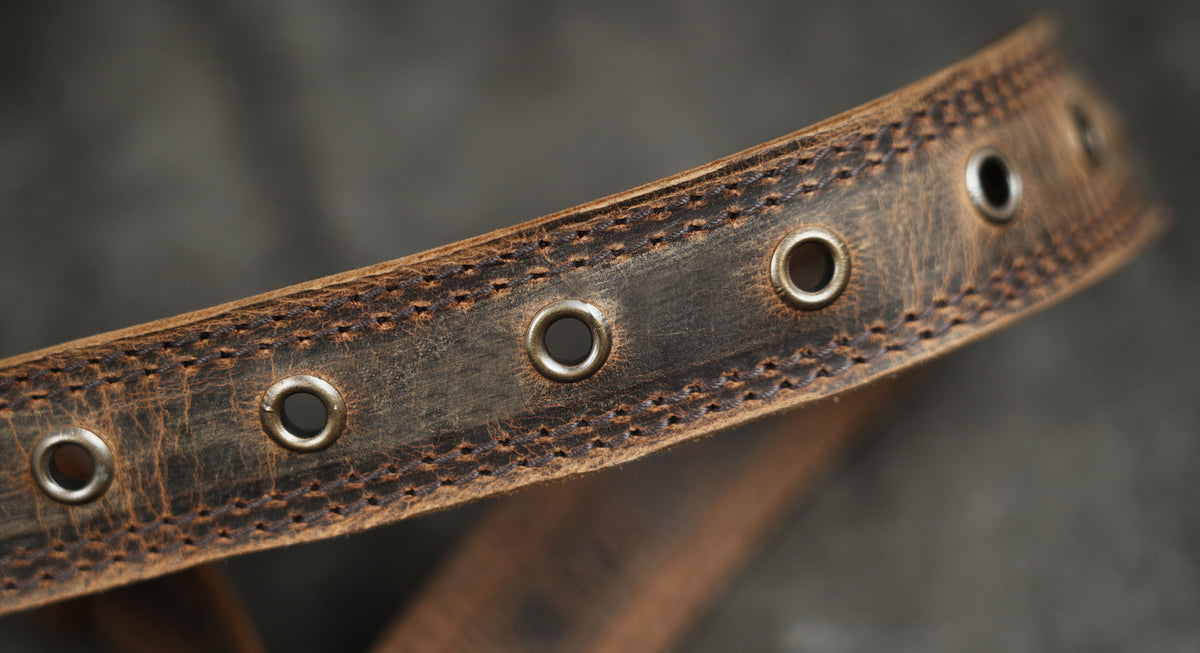 Rustic tooled leather pouch with adjustable belt