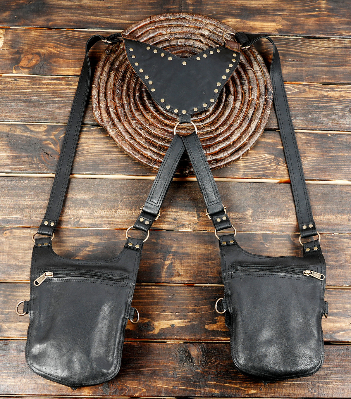 Leather thigh and hip harness bag with two storage pouches and decorative turquoise stones
 