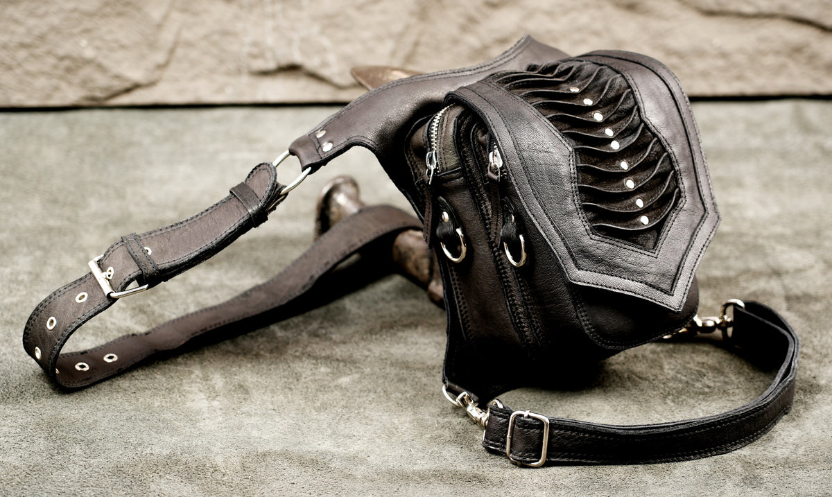 Sci-fi inspired leather thigh bag, stud row close up