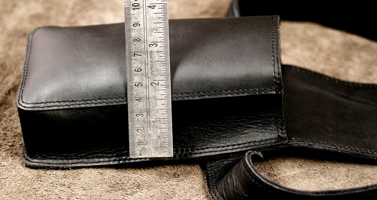 Sleek vertical purse with ornamental clasp closure