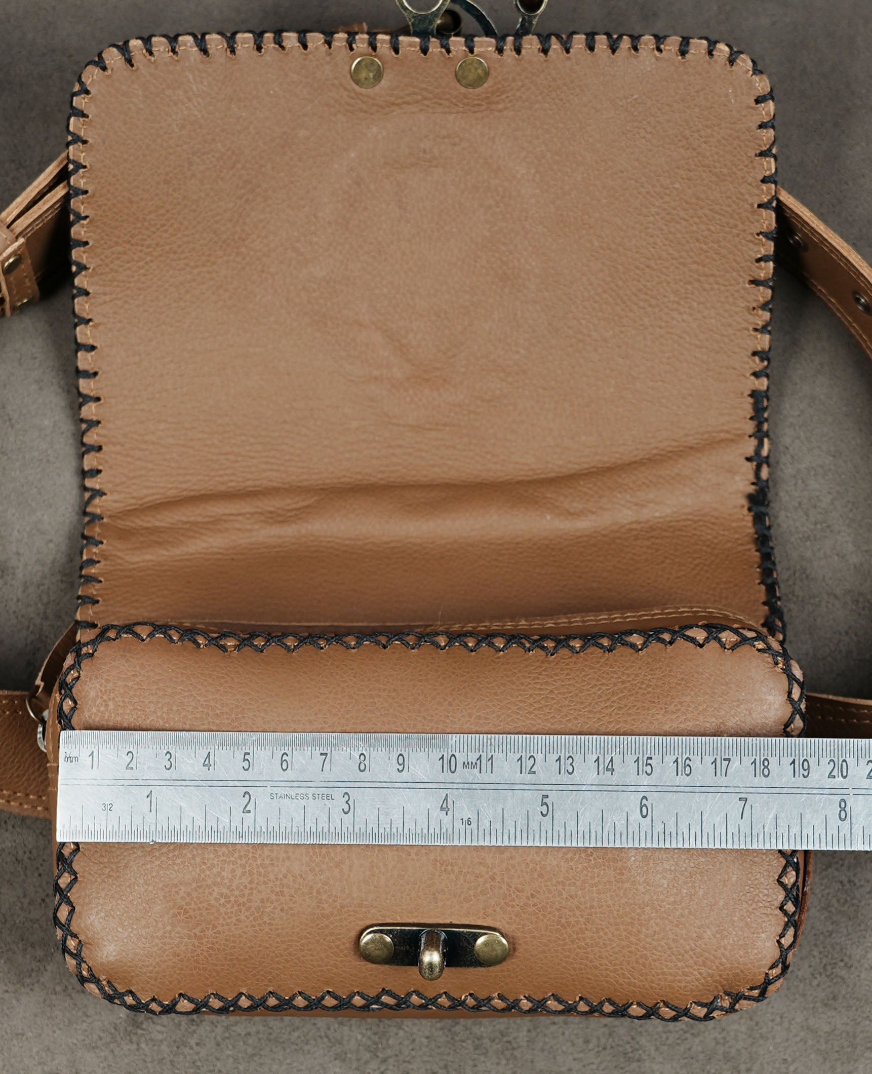 Small leather hip pouch with decorative gemstone