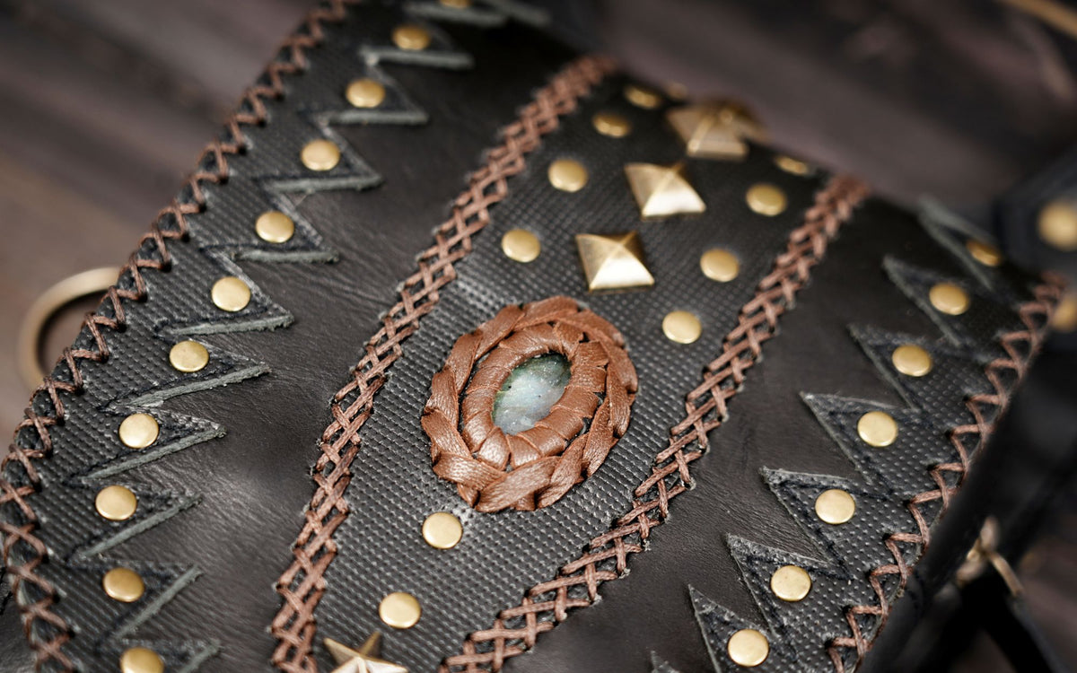 Unisex festival leather harness with twin hip pouches and decorative gemstones
 
