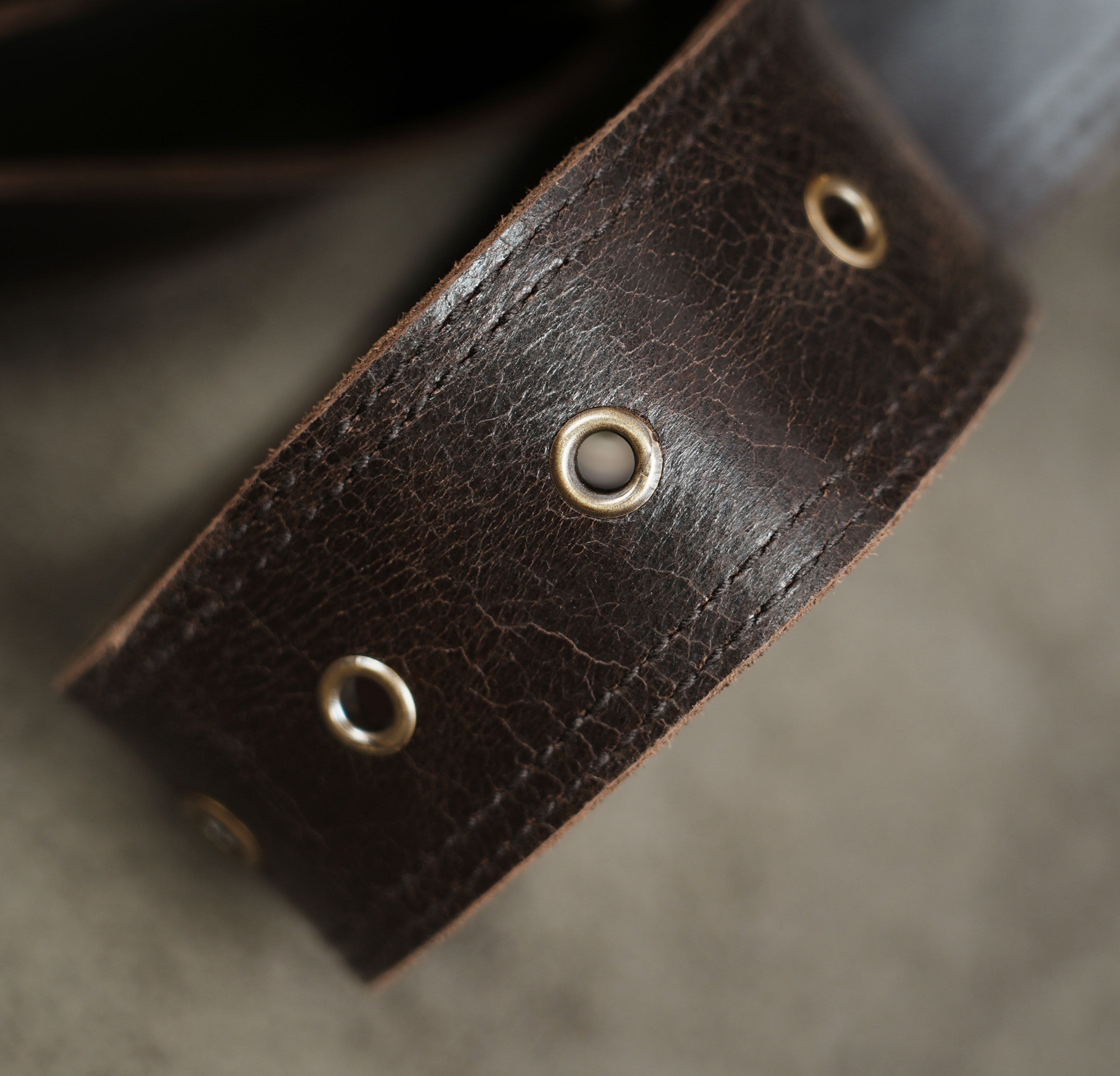 Steampunk leather waist pouch with antique brass hardware and studs