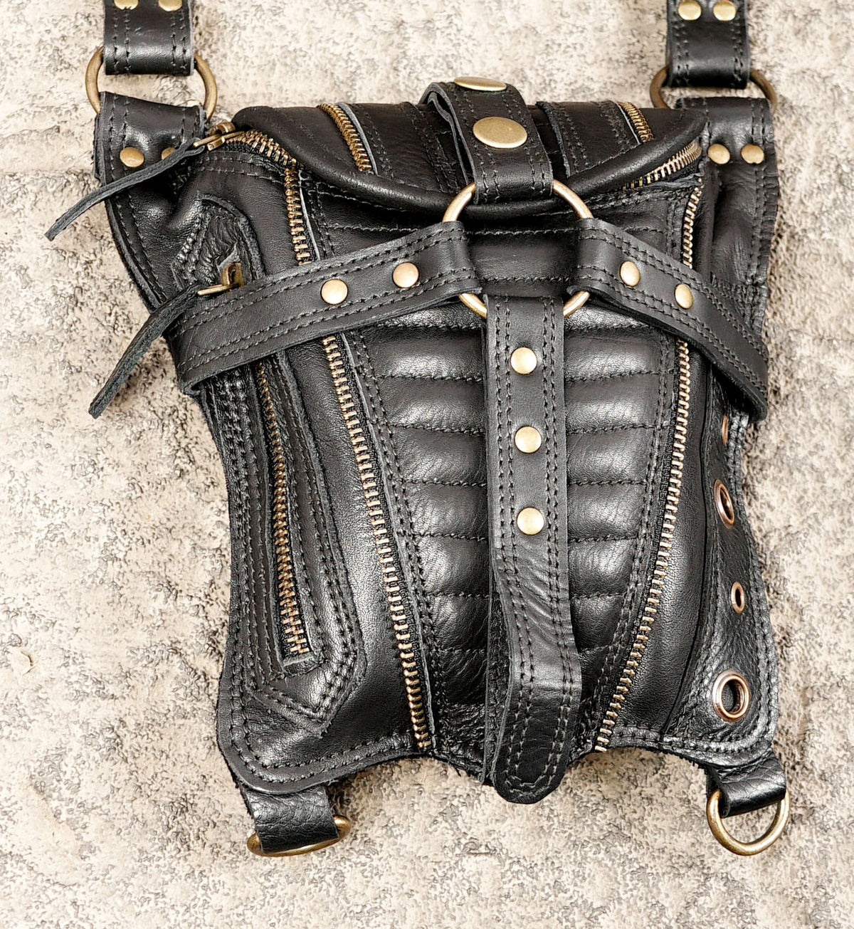 Black gothic festival harness bag with dual pouches decorative straps and metal rings